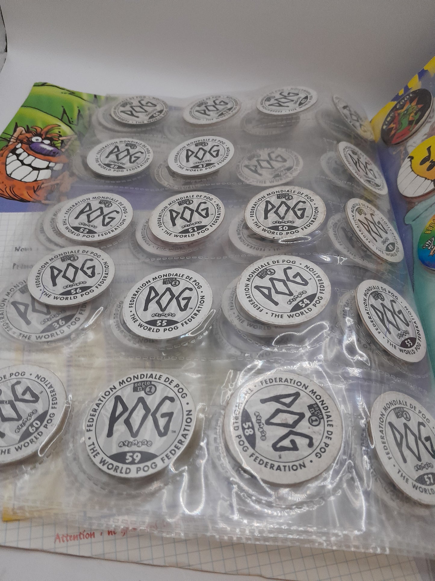 Album de Pogs de la Série Numéro 1 de la World Pog Fédération